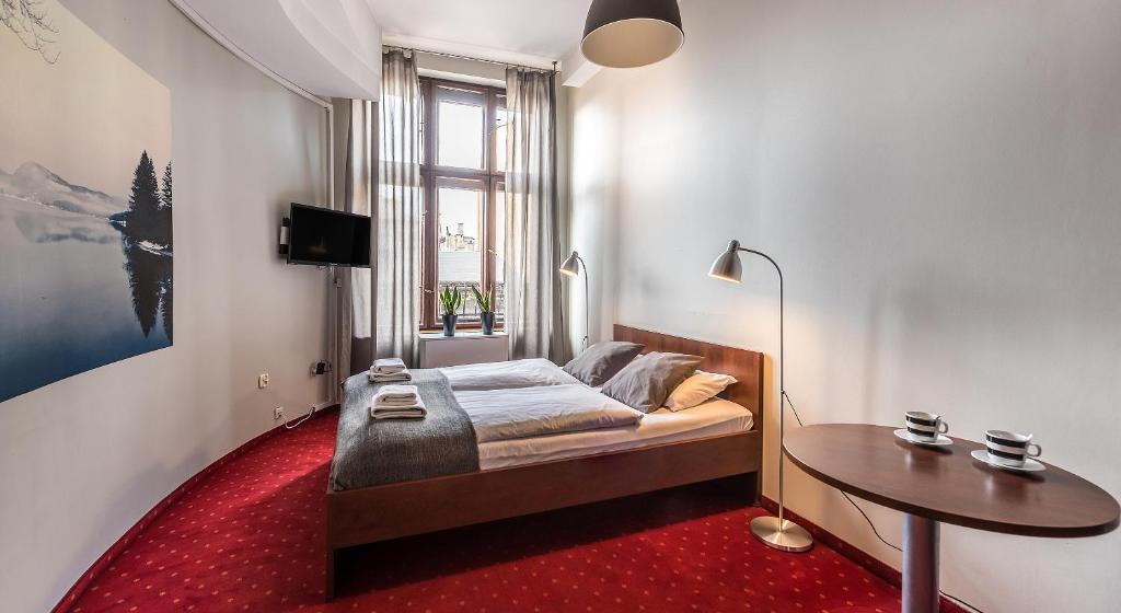 Posteľ alebo postele v izbe v ubytovaní Flamingo Premium Hostel