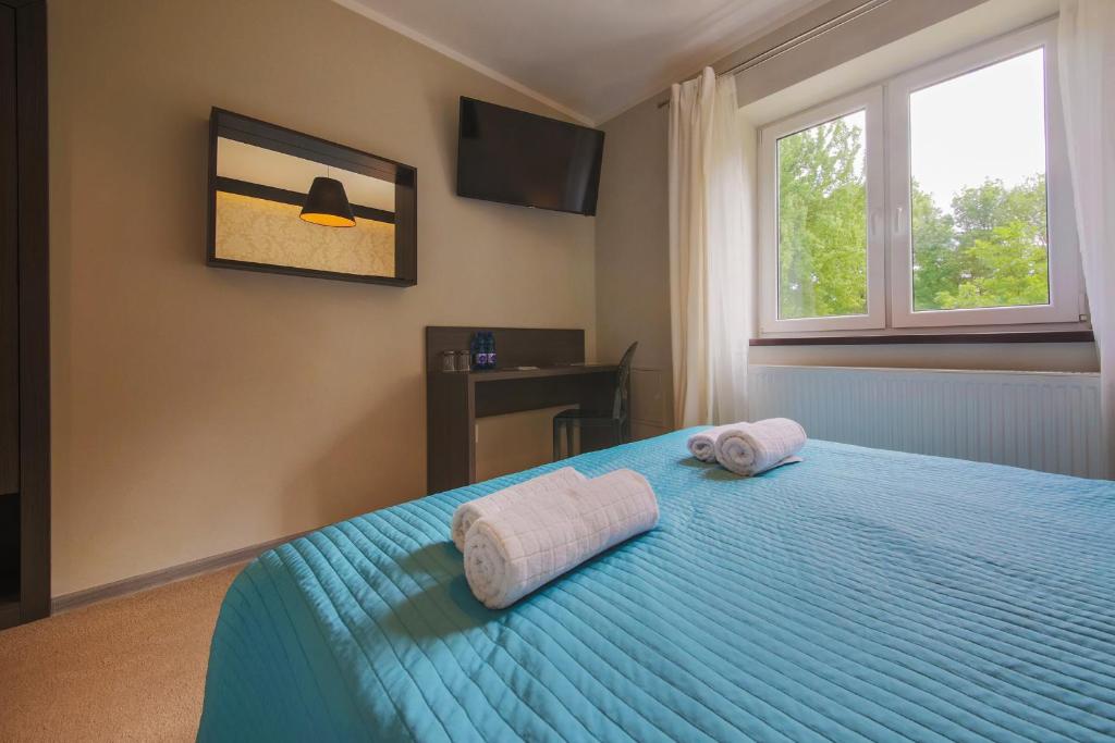Postel nebo postele na pokoji v ubytování B&M Guesthouse