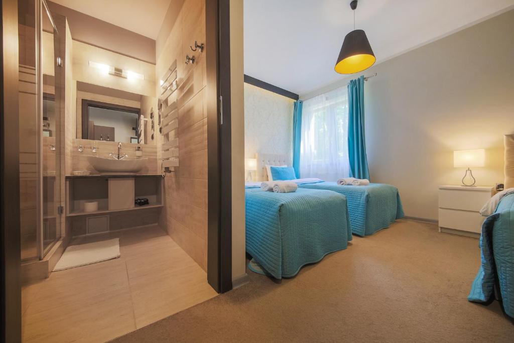 Postel nebo postele na pokoji v ubytování B&M Guesthouse