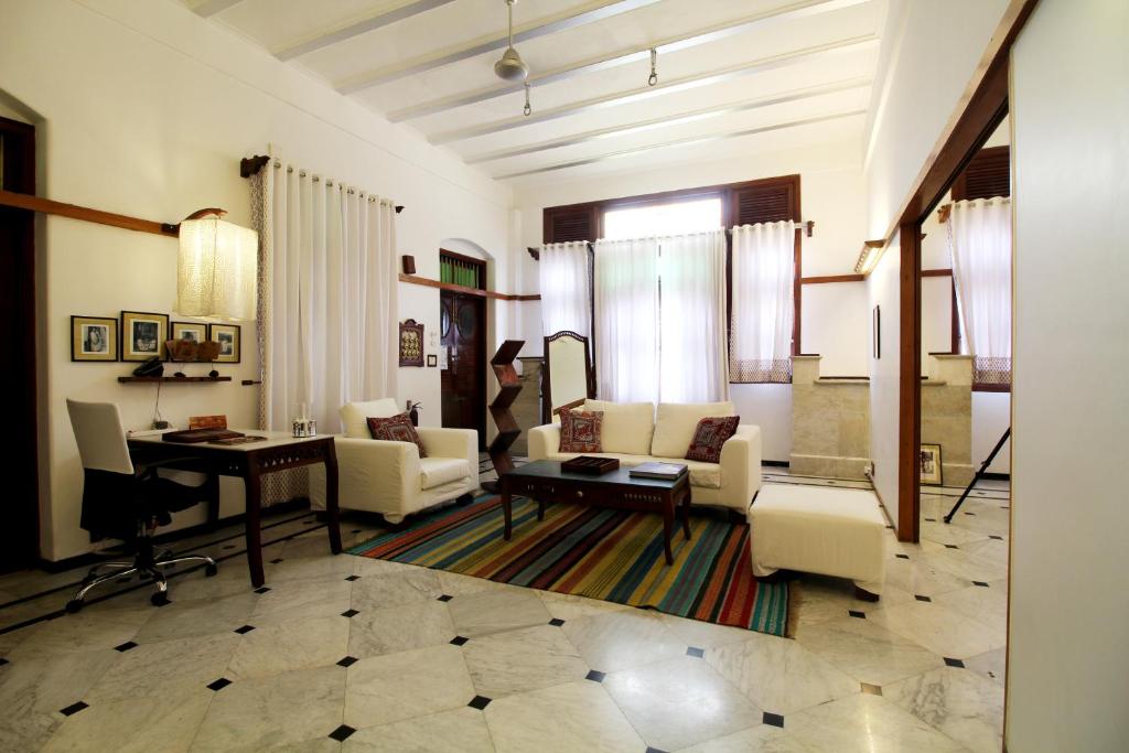 Posezení v ubytování The House of MG-A Heritage Hotel, Ahmedabad