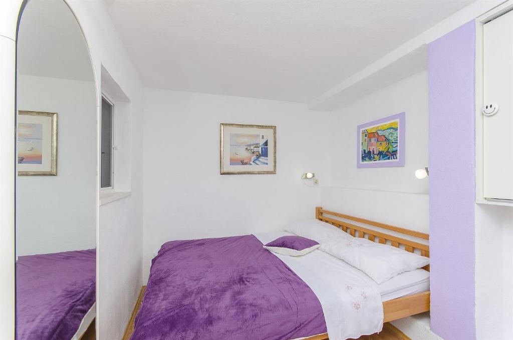 Postel nebo postele na pokoji v ubytování Apartment Antonio