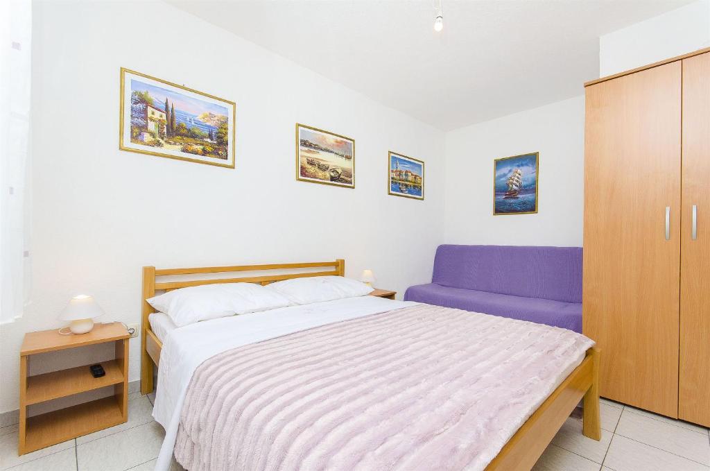 Postel nebo postele na pokoji v ubytování Apartment Antonio