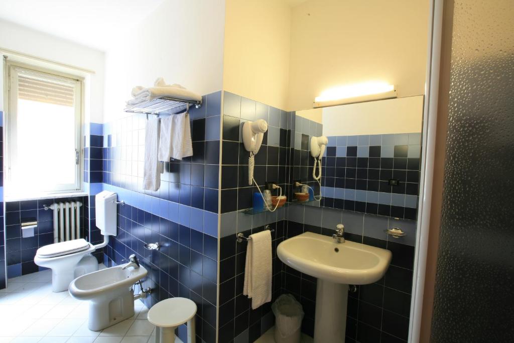 Koupelna v ubytování Hotel Roma
