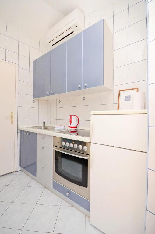 Kuchyň nebo kuchyňský kout v ubytování Apartments Hrgovic