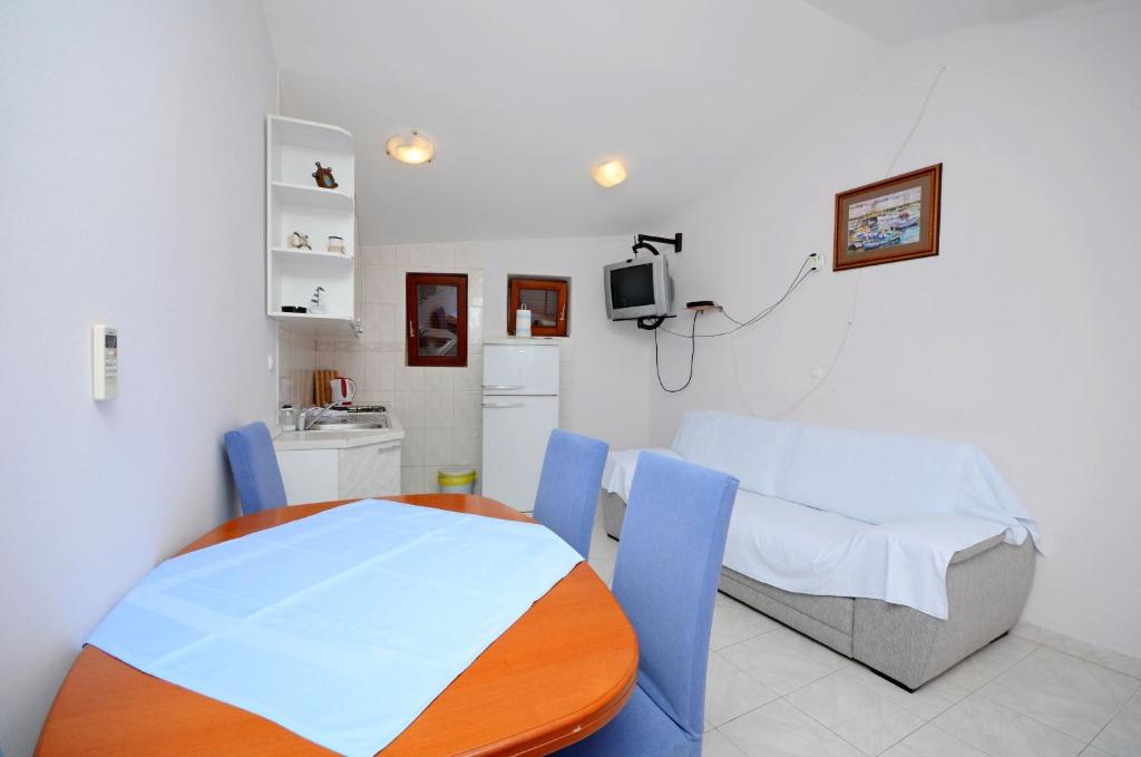 Postel nebo postele na pokoji v ubytování Apartments Hrgovic