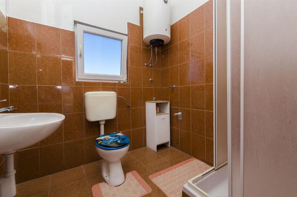 Koupelna v ubytování Apartments Zdenka