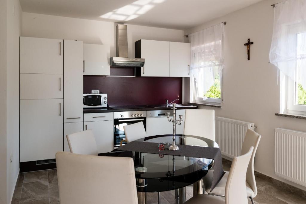Kuchyňa alebo kuchynka v ubytovaní Ferienhaus Bucic