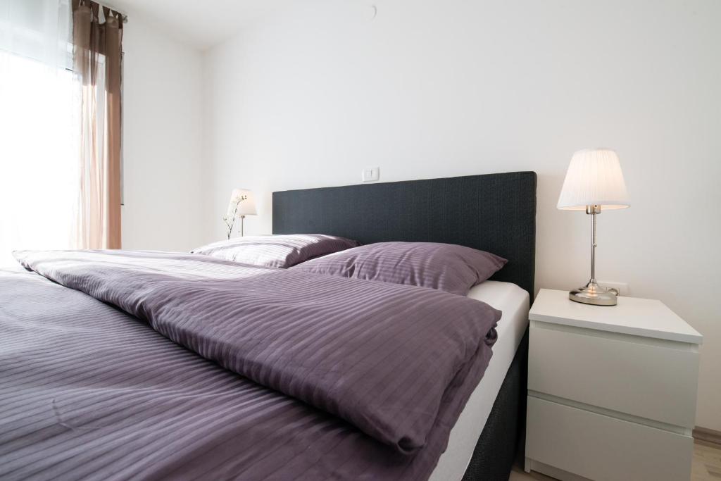 Posteľ alebo postele v izbe v ubytovaní Ferienhaus Bucic