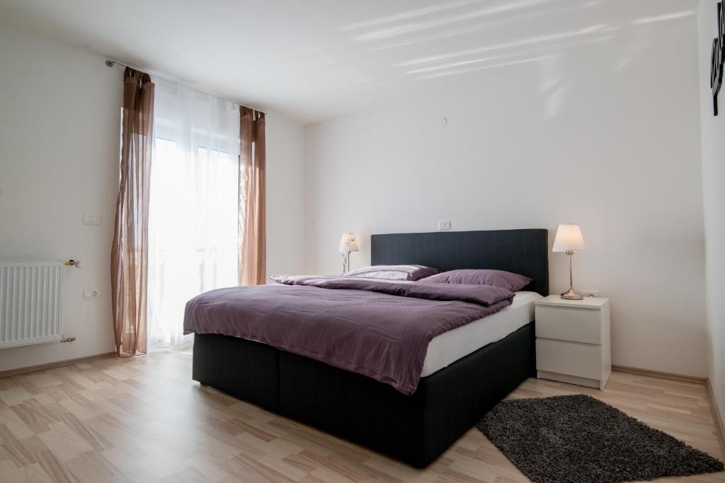 Posteľ alebo postele v izbe v ubytovaní Ferienhaus Bucic