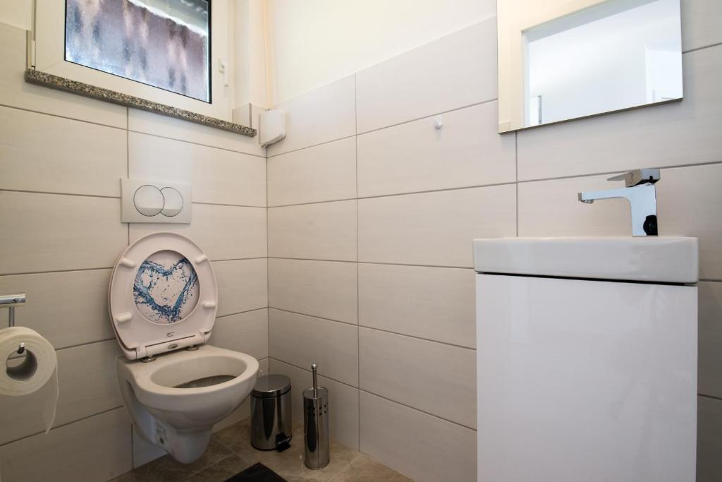 Kúpeľňa v ubytovaní Ferienhaus Bucic