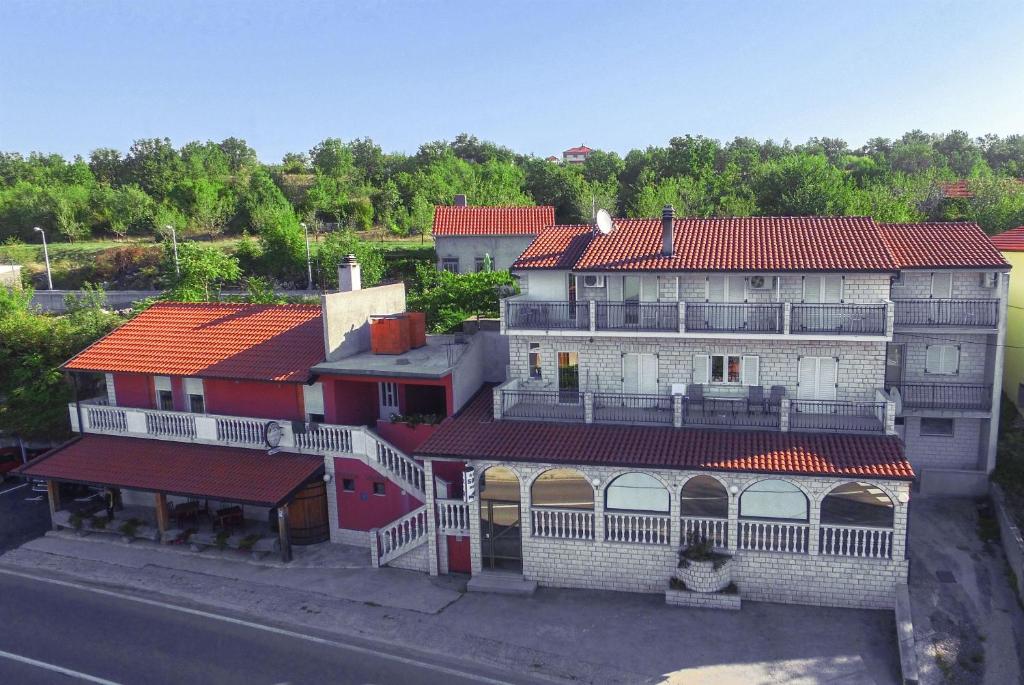 an overhead view of a building with red roofs at Rooms Marijana in Trilj