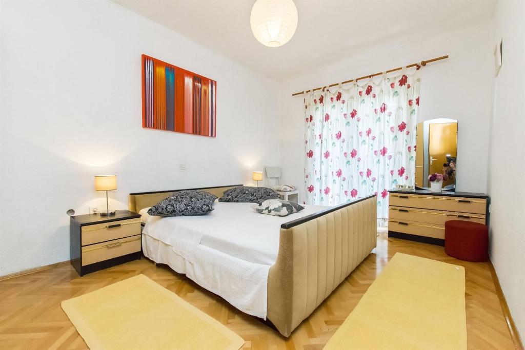 Posteľ alebo postele v izbe v ubytovaní Apartment Zorka