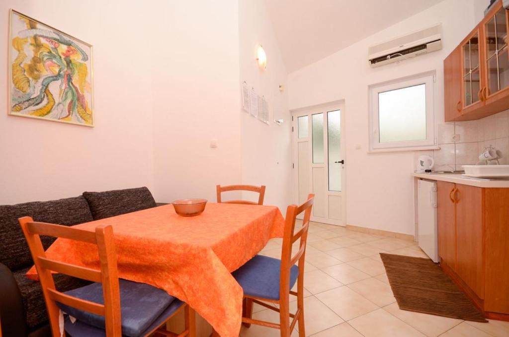 Kuchyň nebo kuchyňský kout v ubytování Apartments Silvana