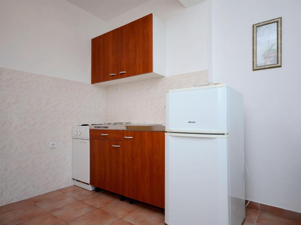 Kuchyň nebo kuchyňský kout v ubytování Apartments Marijo