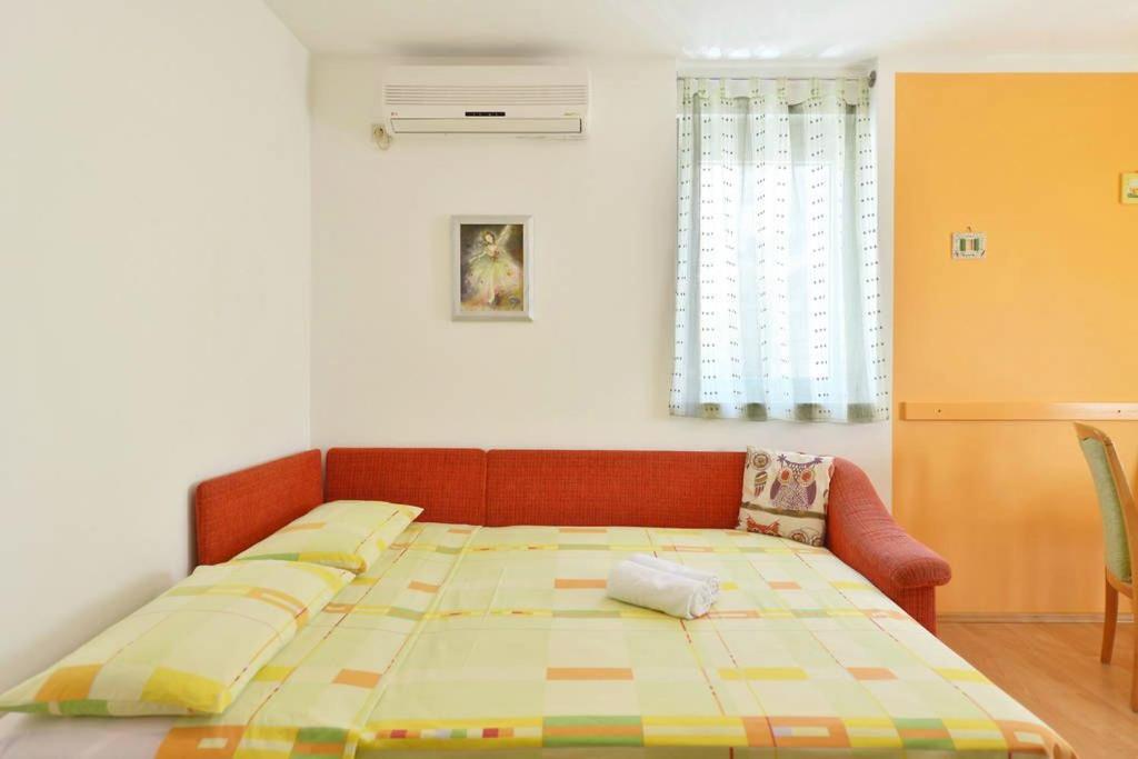Posteľ alebo postele v izbe v ubytovaní Apartment Vicko