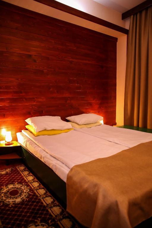 Postel nebo postele na pokoji v ubytování Hotel Silva