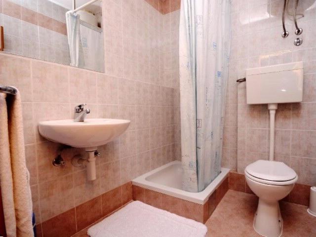 Kúpeľňa v ubytovaní Apartments Meridiana 2