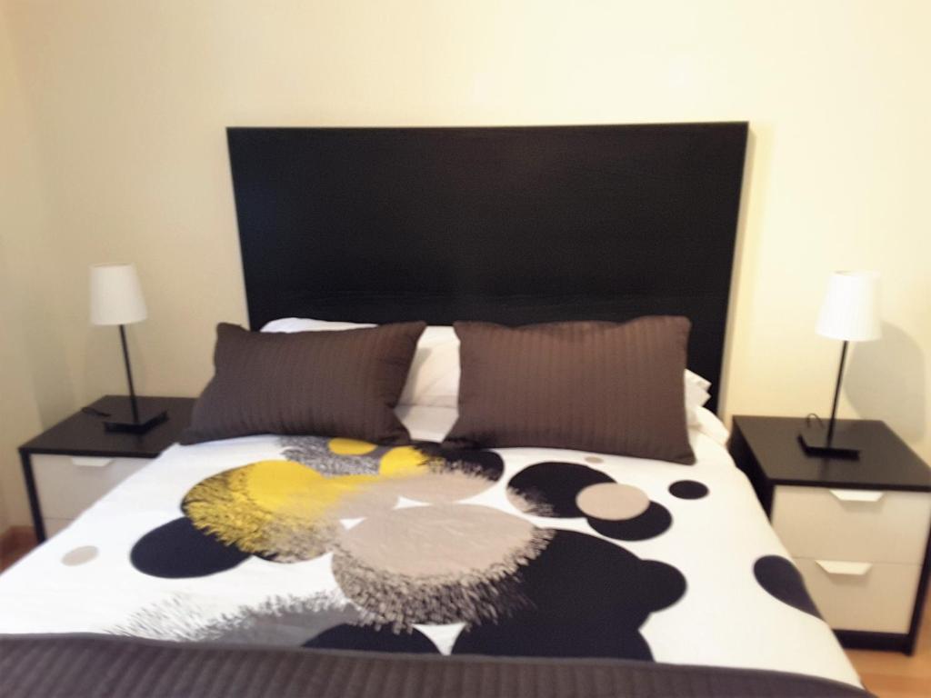 Postel nebo postele na pokoji v ubytování Apartamentos Argualas