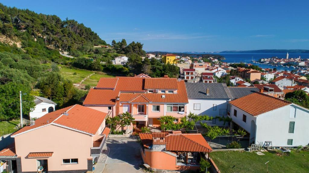 a view of a town with houses at Apartments Darko in Rab