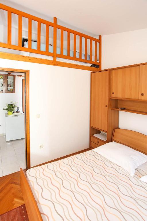 Posteľ alebo postele v izbe v ubytovaní Apartments Patricia