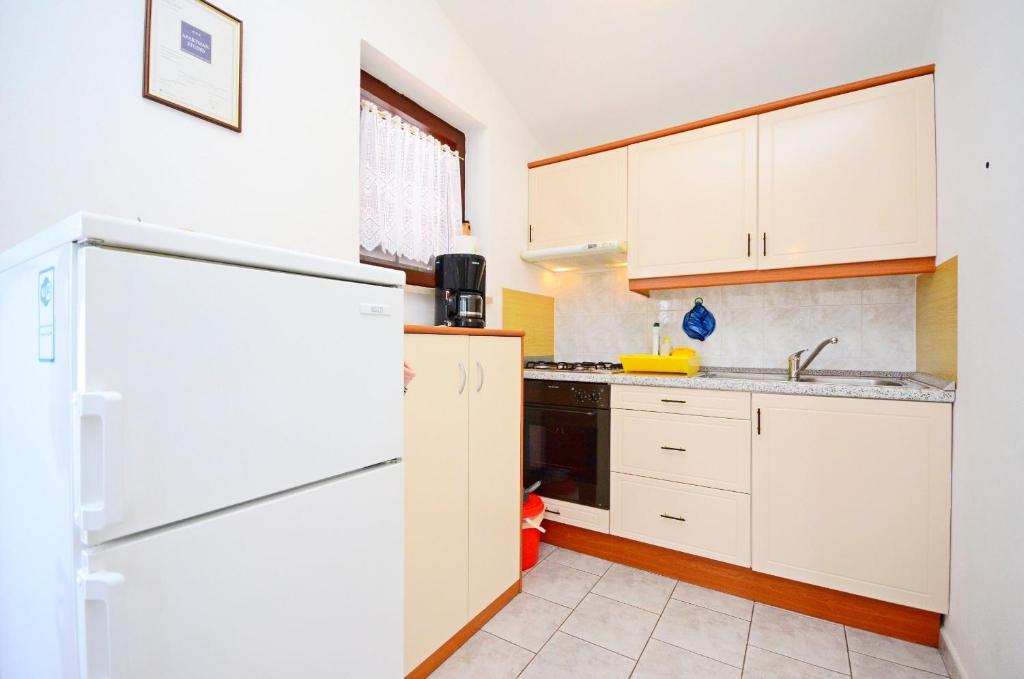 Kuchnia lub aneks kuchenny w obiekcie Apartments Bogetic