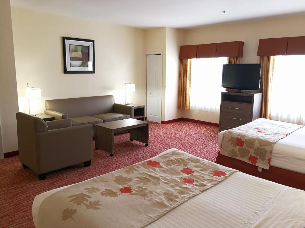 Postel nebo postele na pokoji v ubytování Hawthorn Suites Irving DFW South