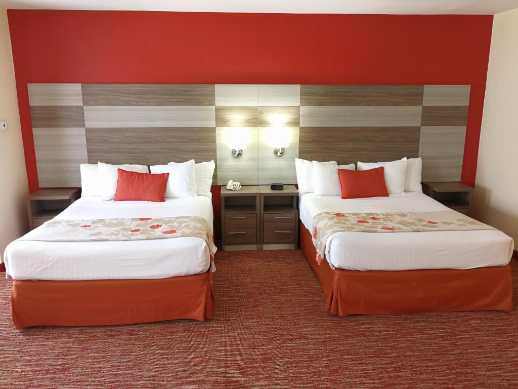 Postel nebo postele na pokoji v ubytování Hawthorn Suites Irving DFW South
