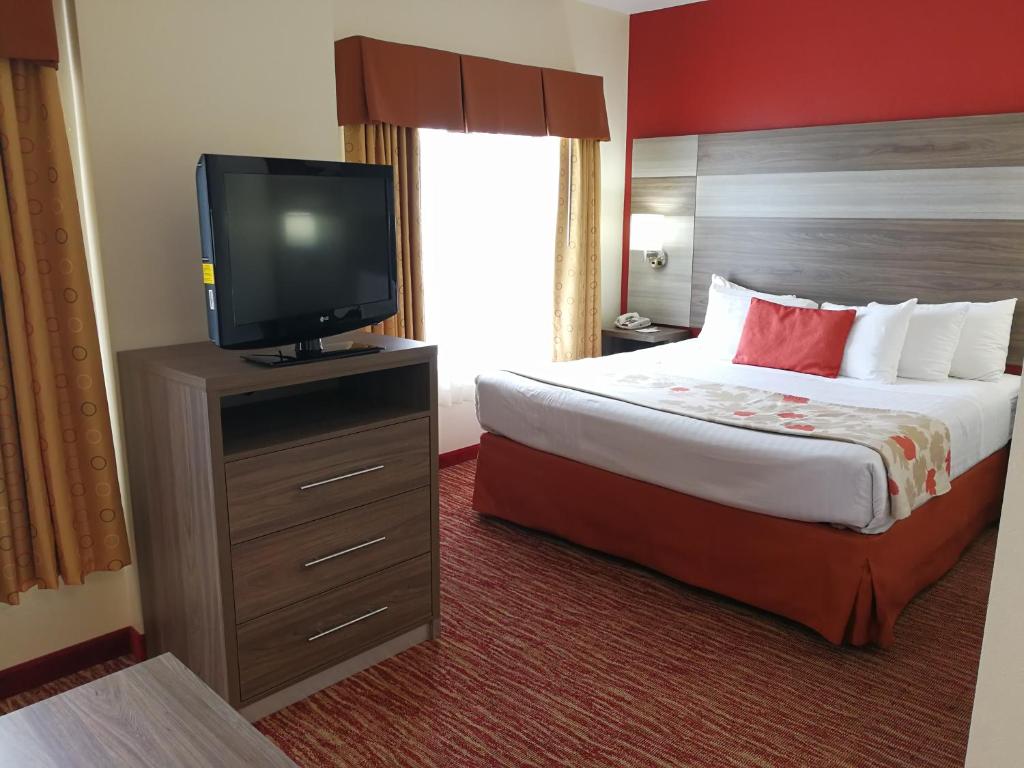Postel nebo postele na pokoji v ubytování Hawthorn Suites Irving DFW South