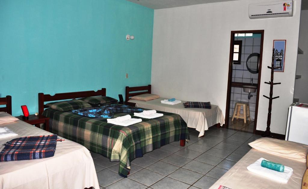 Postel nebo postele na pokoji v ubytování Pousada Casa da Geleia