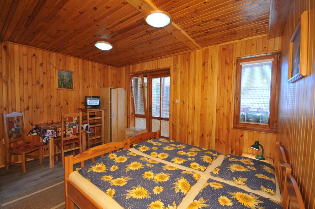 Postel nebo postele na pokoji v ubytování Penzion Jendrál