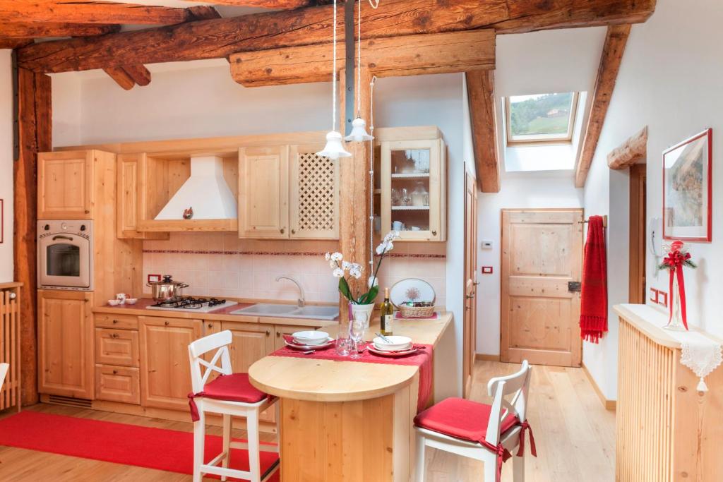 Cucina o angolo cottura di Albergo Diffuso Sauris in Sauris di Sotto