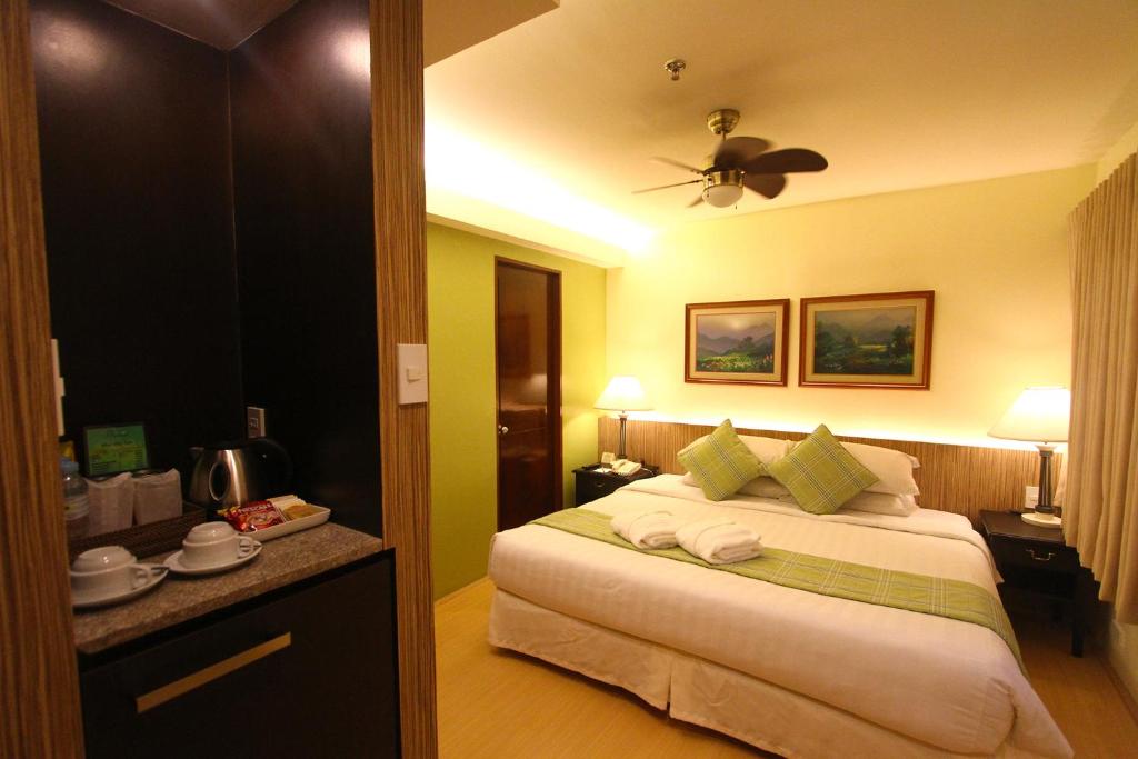 Postel nebo postele na pokoji v ubytování Hotel Fleuris