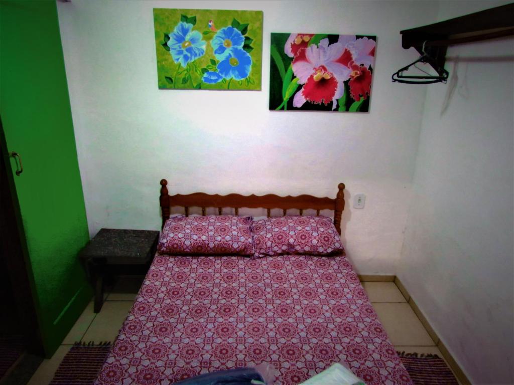 Postel nebo postele na pokoji v ubytování Aracy Paraty