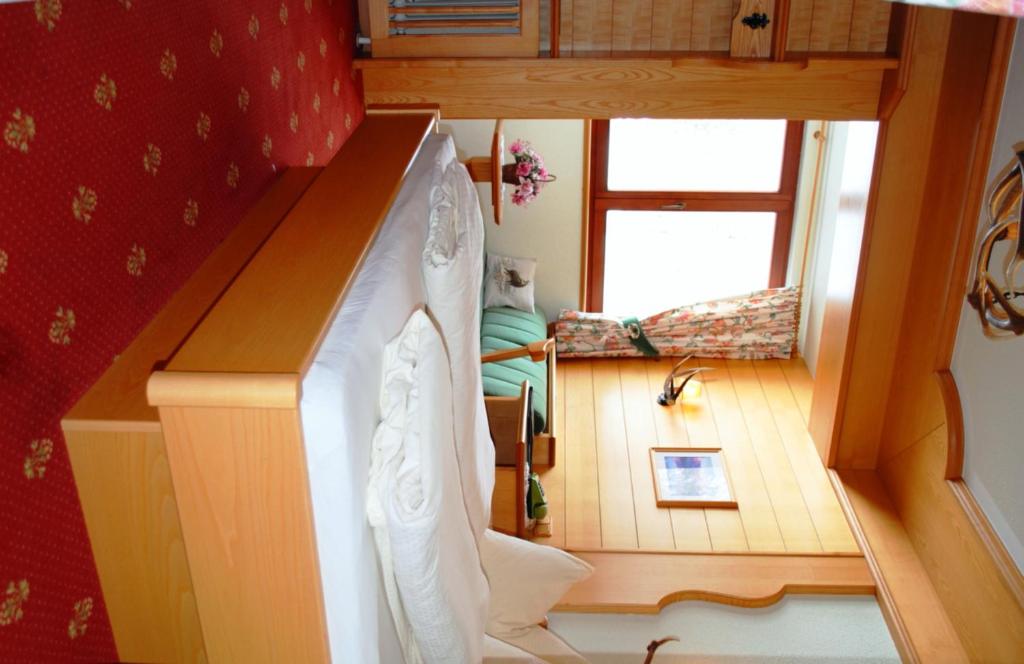 Postel nebo postele na pokoji v ubytování Hotel Jagdhof
