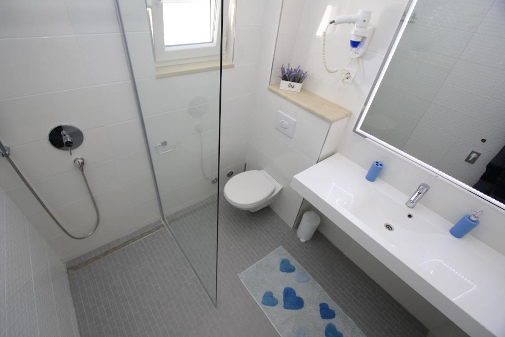 Kúpeľňa v ubytovaní Villa Domus
