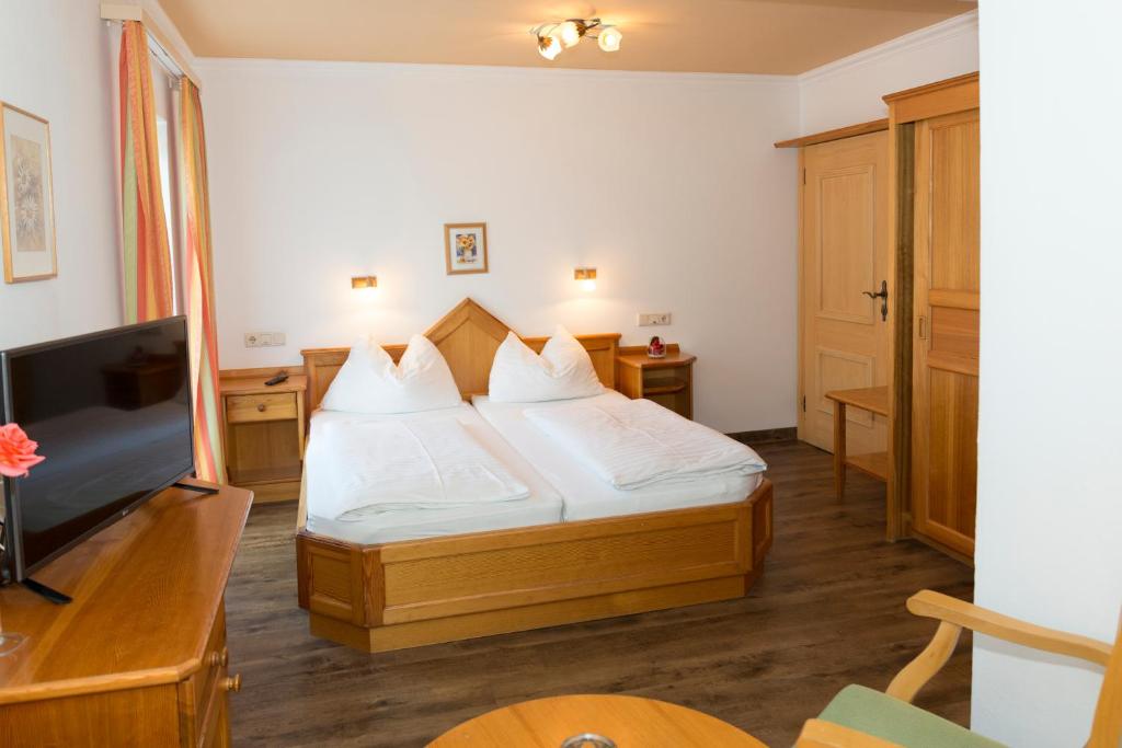 Postel nebo postele na pokoji v ubytování Haus Hubertus