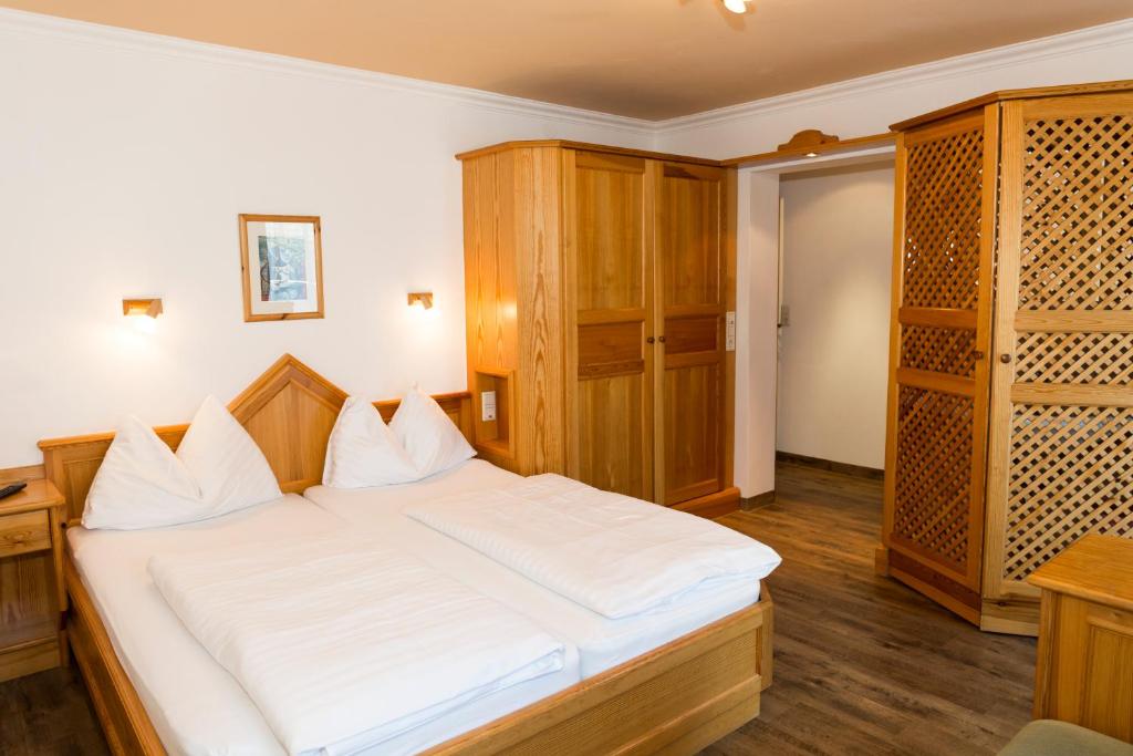 Postel nebo postele na pokoji v ubytování Haus Hubertus