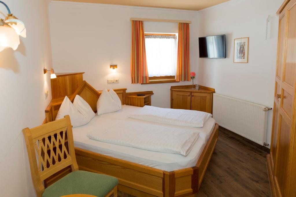 Postel nebo postele na pokoji v ubytování Haus Hubertus