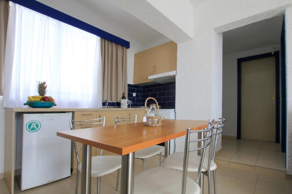 Kuchyň nebo kuchyňský kout v ubytování Christiana Hotel Apartments