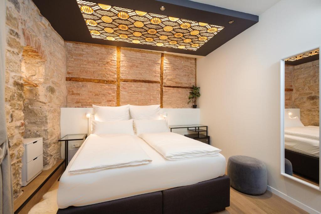 Posteľ alebo postele v izbe v ubytovaní Luxury Rooms Bajamonti