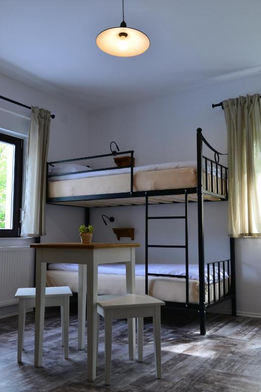Postel nebo postele na pokoji v ubytování Hostel Hildegarden