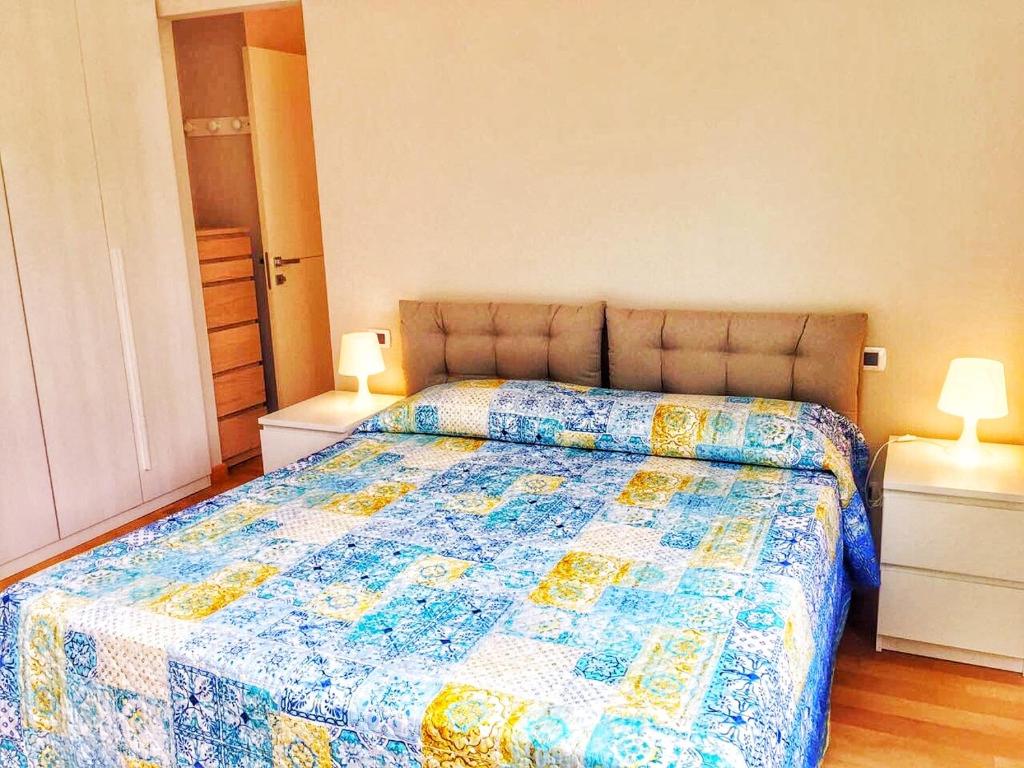 Postel nebo postele na pokoji v ubytování Oleandro 2 apartment in Villa Cerutti