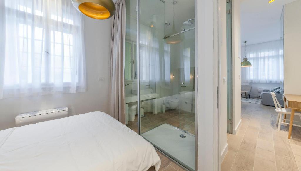 Postel nebo postele na pokoji v ubytování AH Design Luxury Apartments