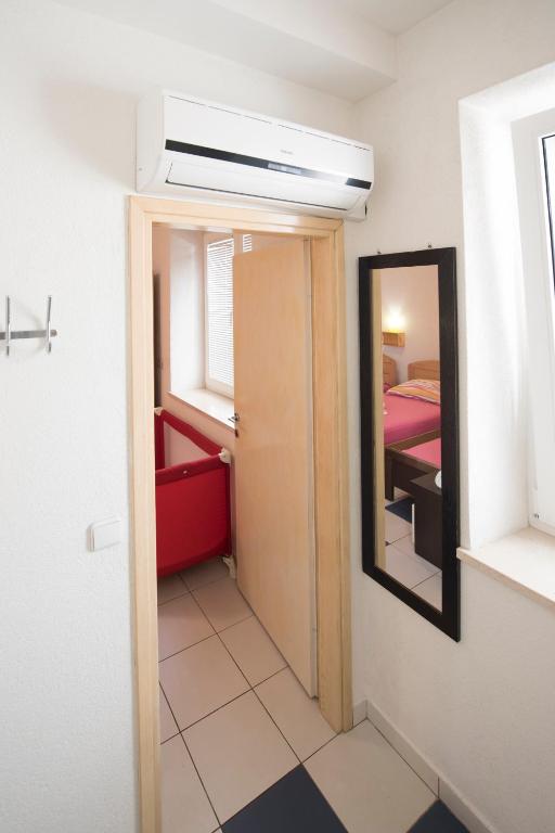 Posteľ alebo postele v izbe v ubytovaní Apartment Dragica