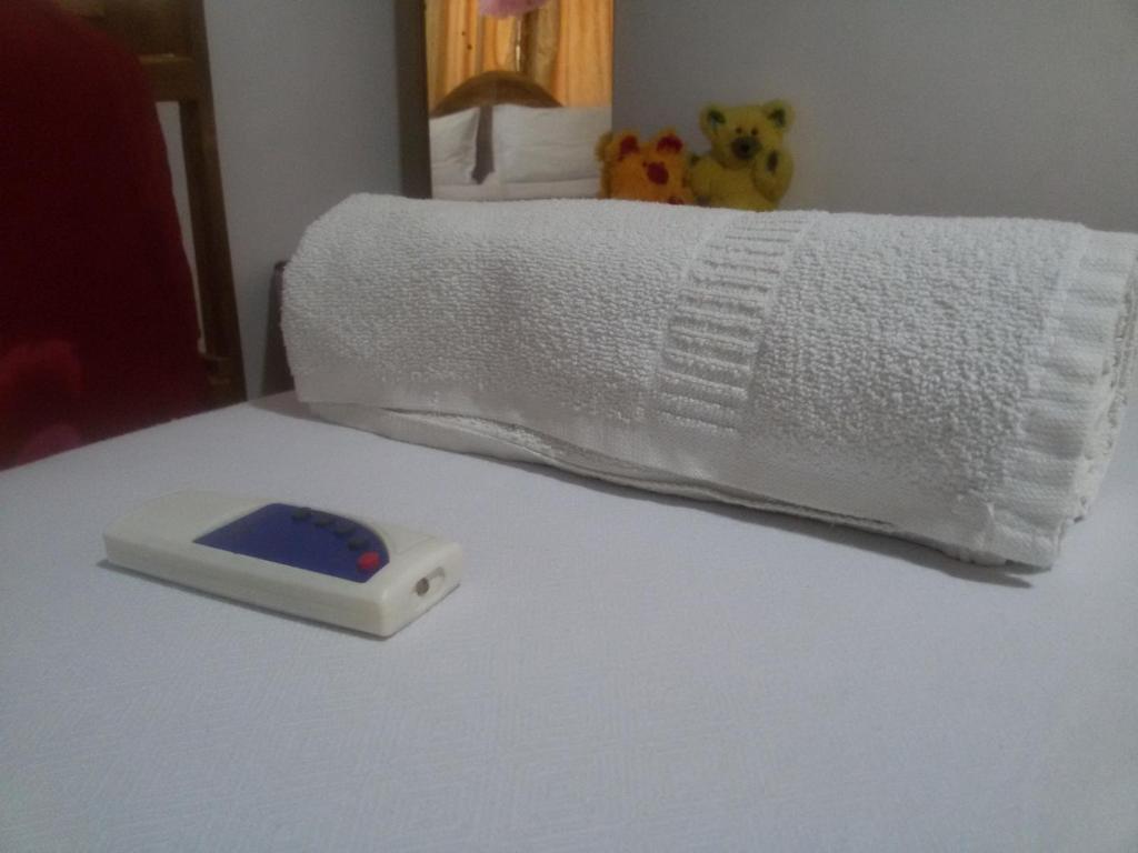 Postel nebo postele na pokoji v ubytování Sigiri Binara Villa