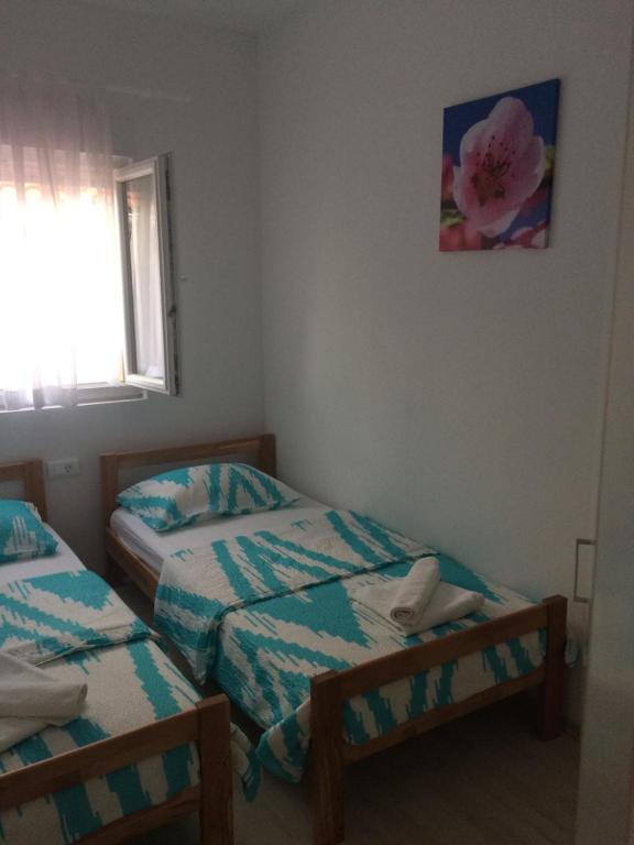 Posteľ alebo postele v izbe v ubytovaní Apartmani Gaga
