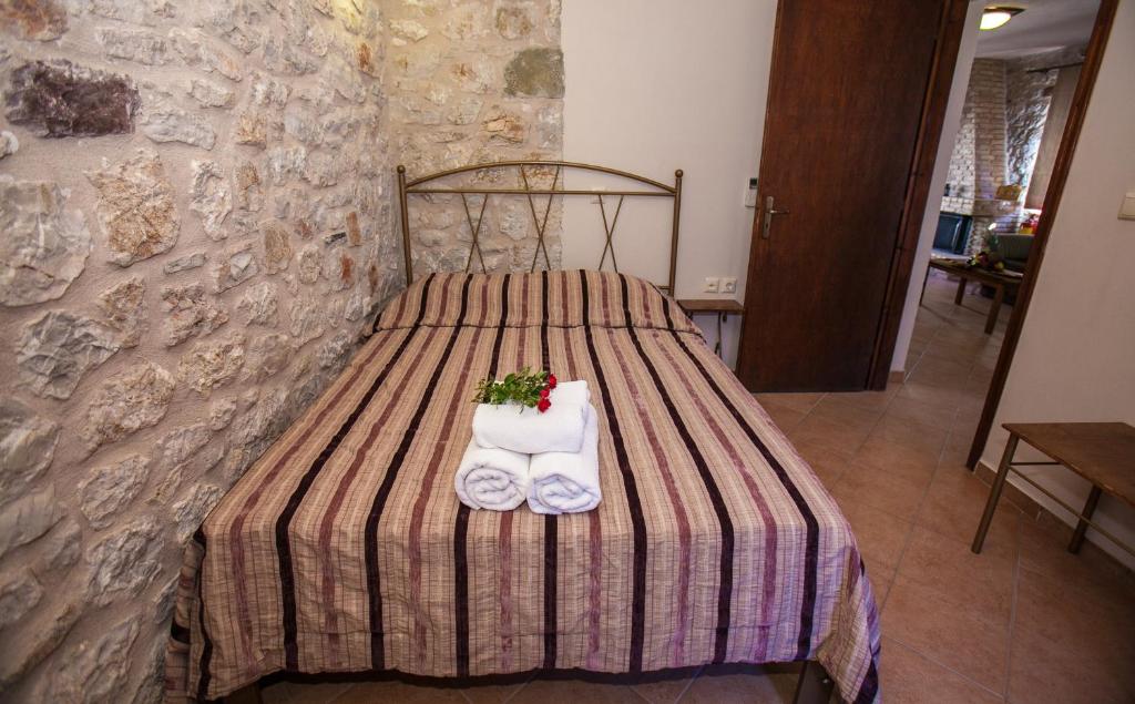 Postel nebo postele na pokoji v ubytování Anigraia