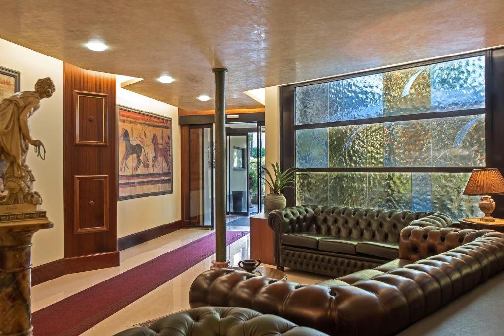 Posezení v ubytování Hotel Columbus sul Lago