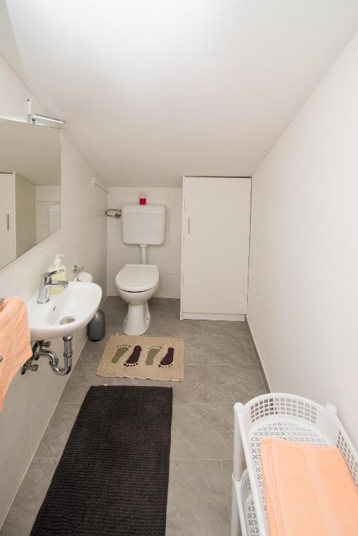 Kúpeľňa v ubytovaní Apartman Marinko
