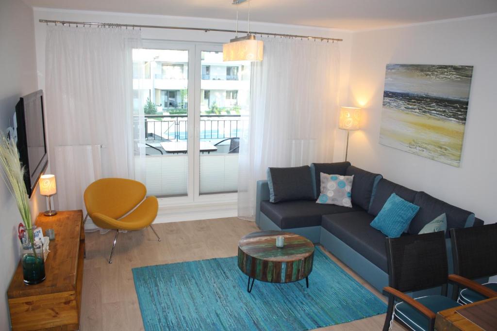 Posedenie v ubytovaní Apartament Szmaragdowy